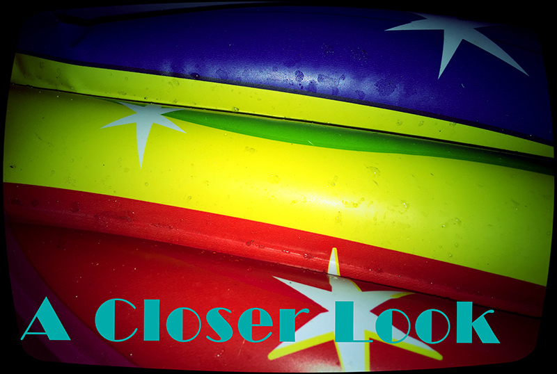 A Closer Look photography group show - Fokianou Art Space Photograph red yellow blue; almost horizontal stripes with three white stars: A Closer Look photography show at Fokianou Art Space