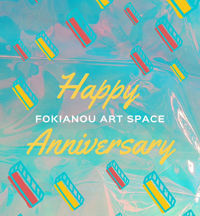 Happy Anniversary. Group Art Show Geometric design in blueish background with slanted 3D yellow and red rectangular shapes. Centered in yellow cursive says Happy Aniversary. Between the two lines: Fokianou Art Space in regular capital white letters