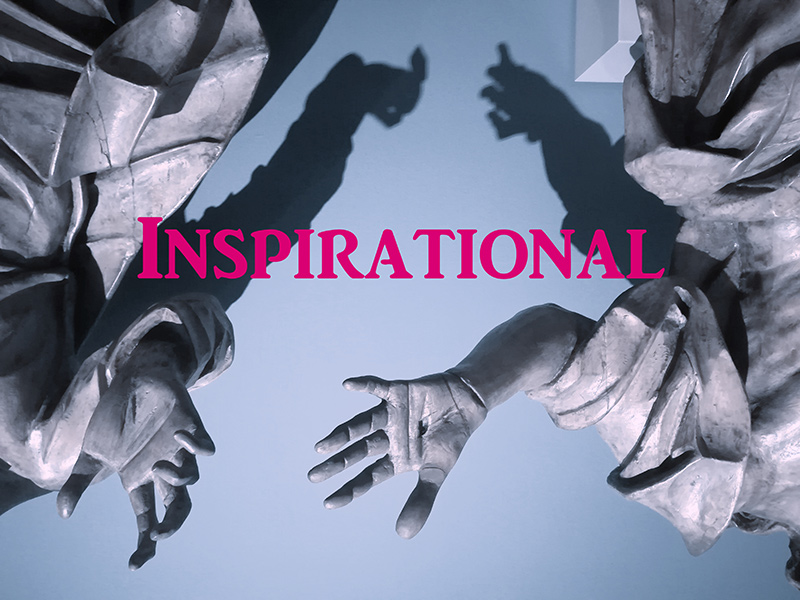 Inspirational group show Composition of inverted hands and bodies monochrome gray. Red letters written across: Inspirational