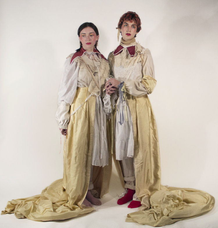 Mother Puce - Performance and Installation: Two people in long elaborate clothing